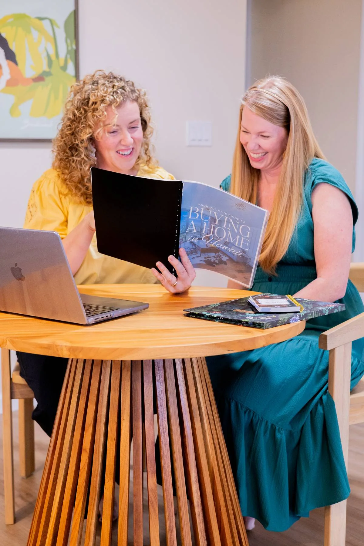 Michela Hinds reviewing a buyer guide with a client
